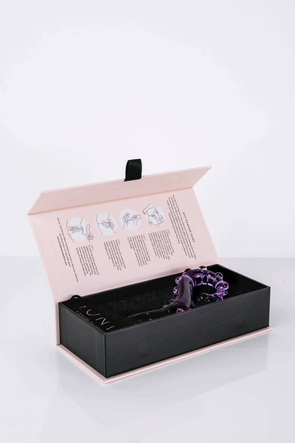 The Sacred Squirter rosa glass-dildo – ergonomisk G-punktstimulering, 13,8 cm, håndlaget i borosilikat-glass med bølget struktur og avrundet tupp.