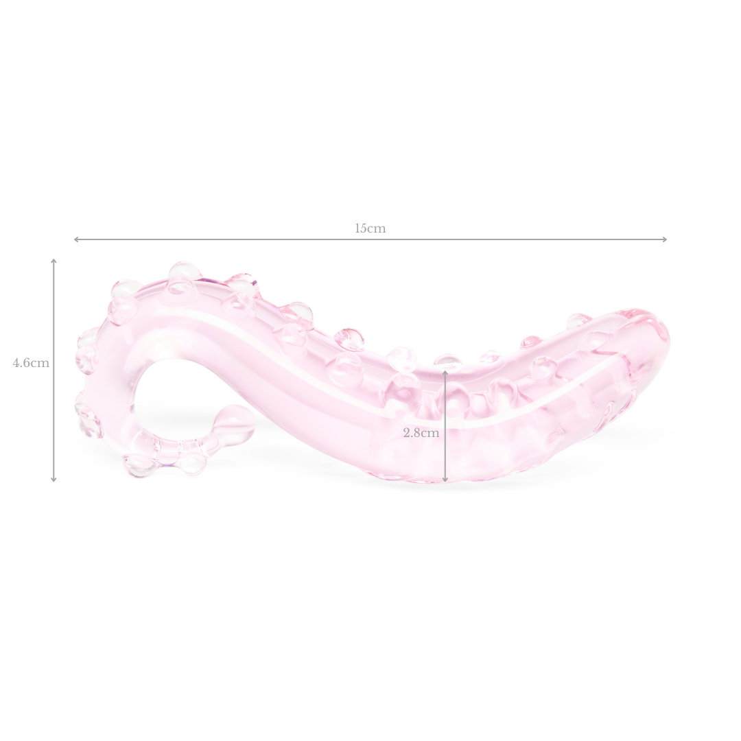 The Sacred Squirter rosa glass-dildo – ergonomisk G-punktstimulering, 13,8 cm, håndlaget i borosilikat-glass med bølget struktur og avrundet tupp.